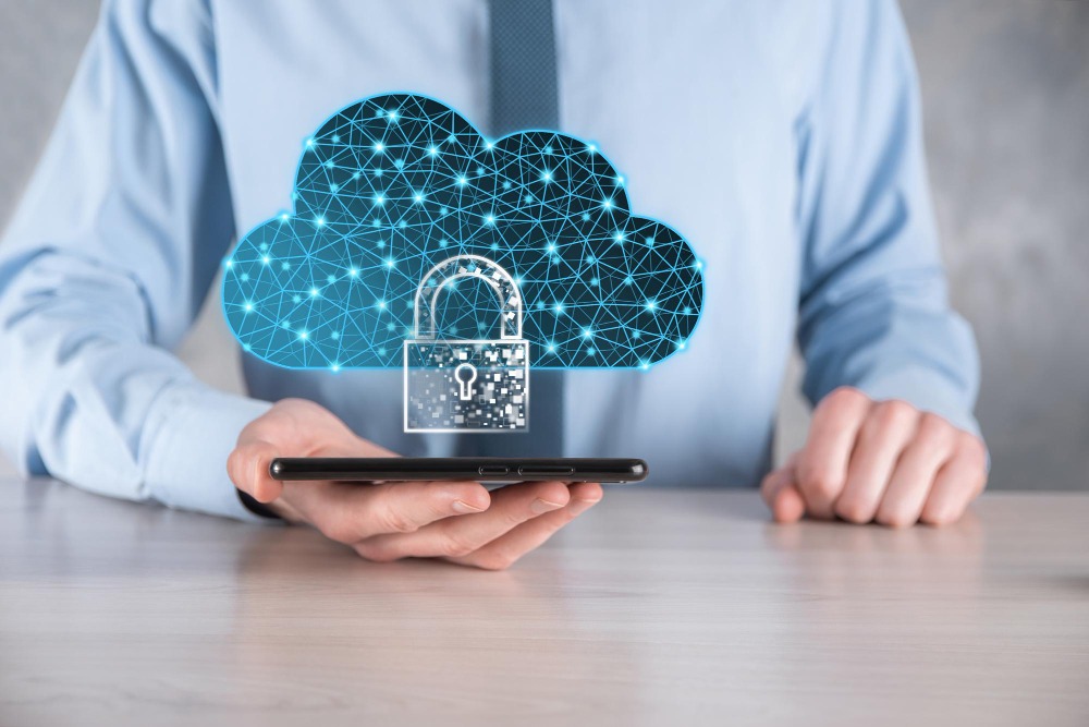 Man holding data cloud in his hand