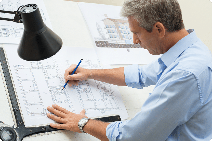 man working on 2d plansAbout GECO Energieberatung​
