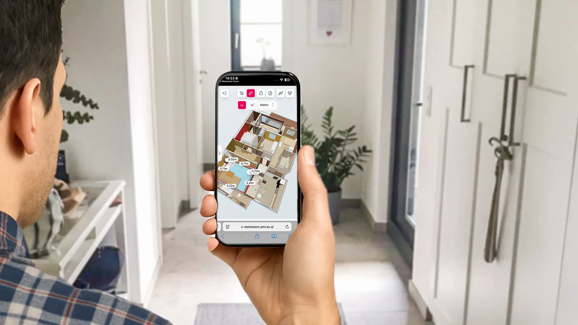 Worker viewing a 3d model of an apartment in his phone